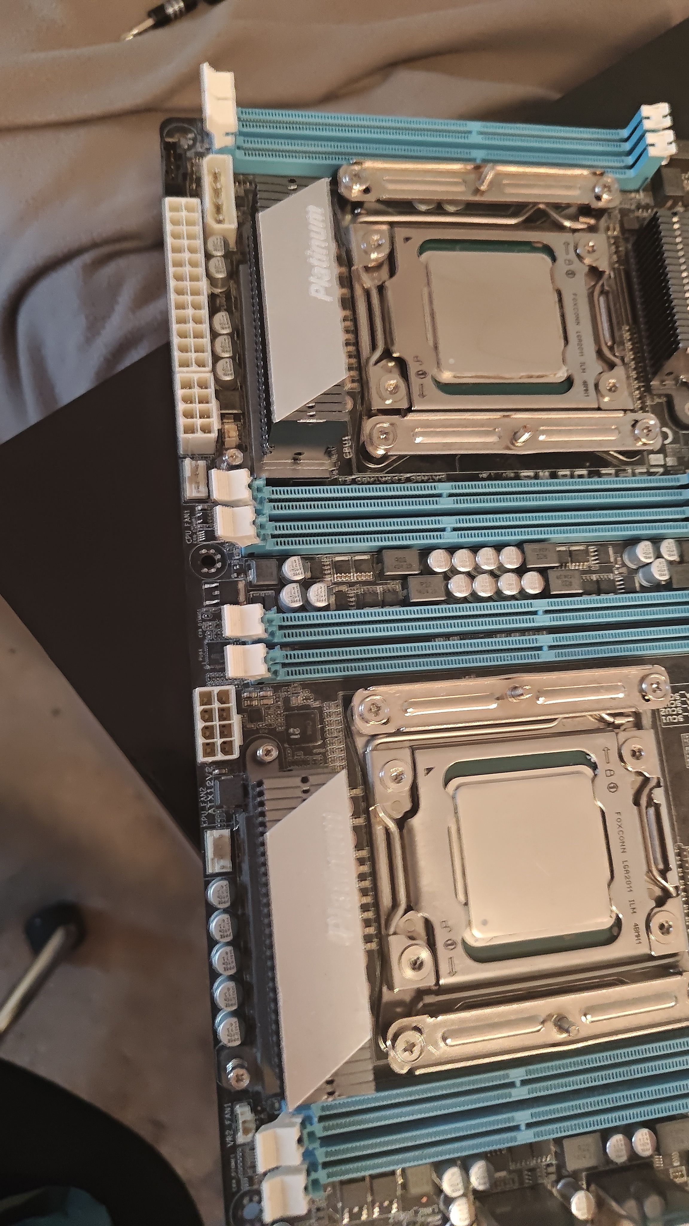 Both E5-2697 CPUs seated in their LGA 2011 sockets on the Z9PE-D8 WS