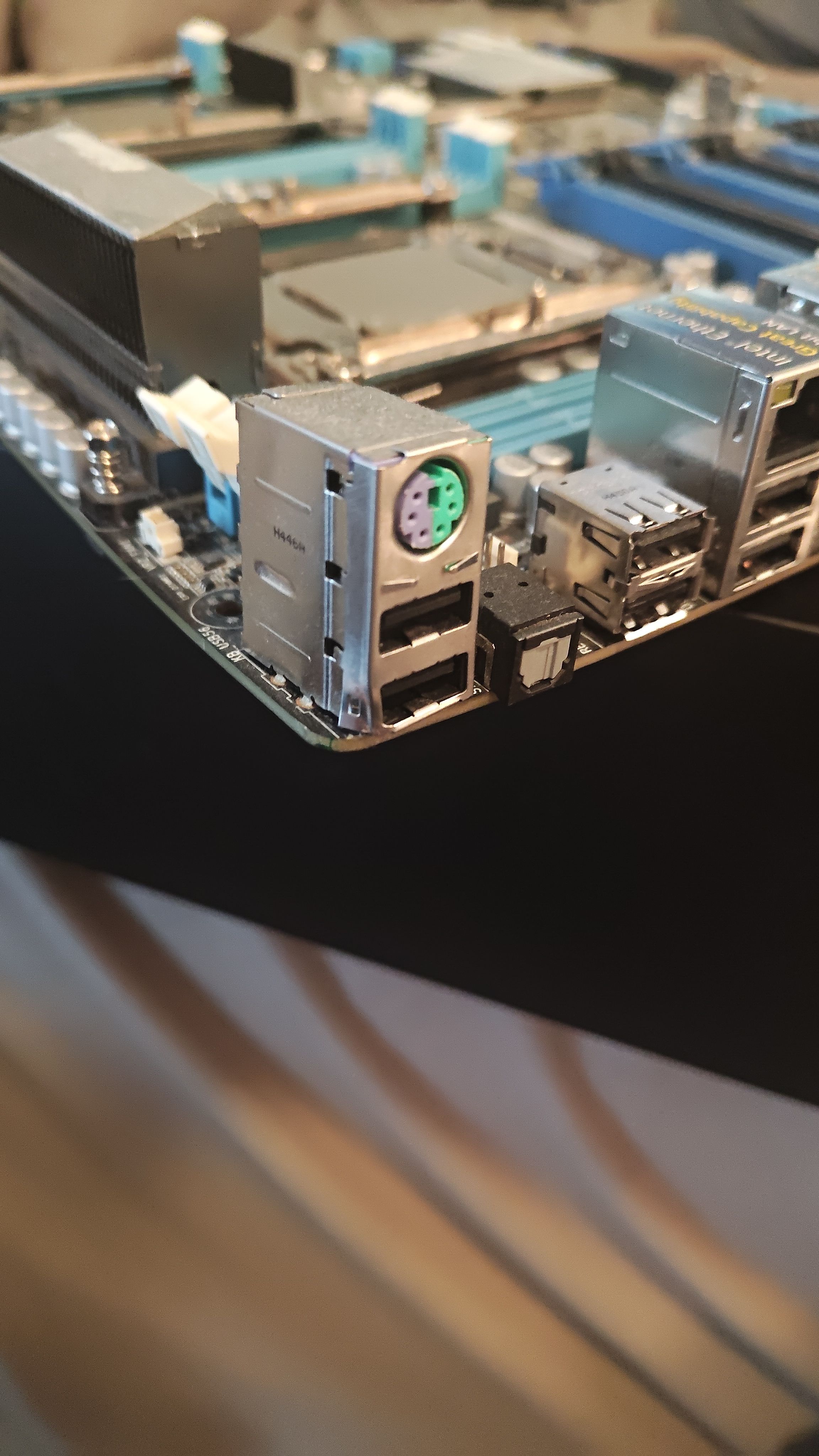 Top left IO corner of the Z9PE-D8 WS showing the shipping damage bend