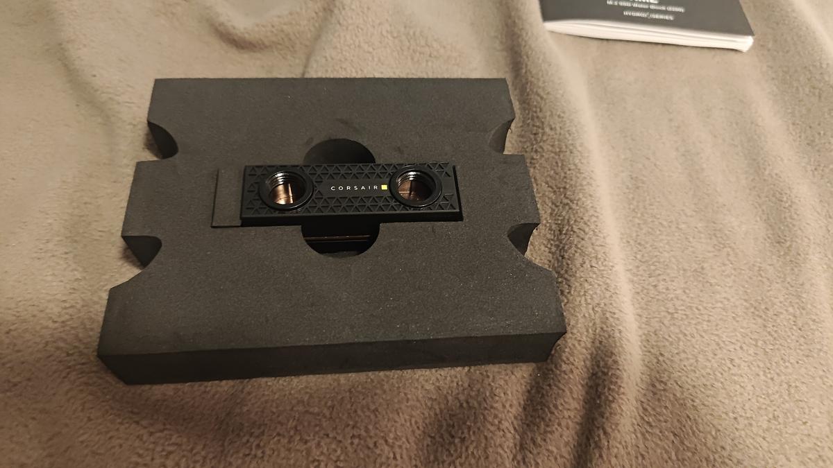 Corsair XM2 waterblock top half — copper contact plate visible