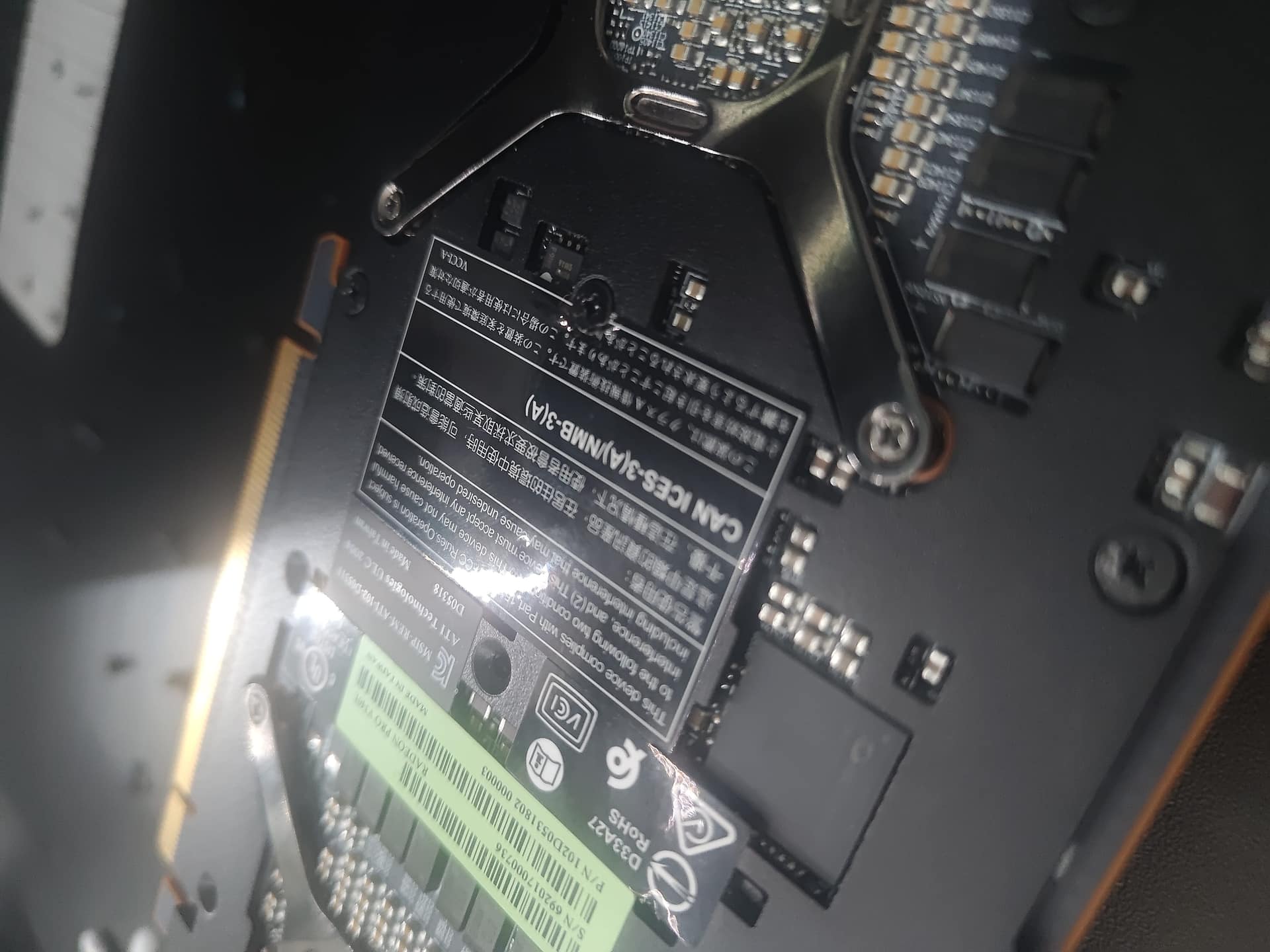 Hidden screw under sticker on V340L backplate