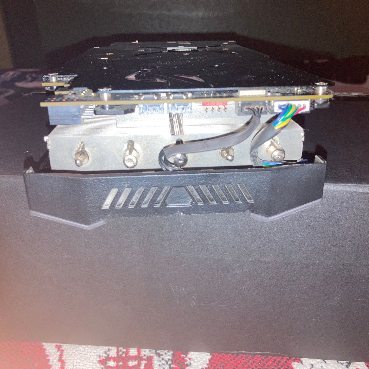 Cooler removed — showing the mounting hardware and cooler assembly from underneath