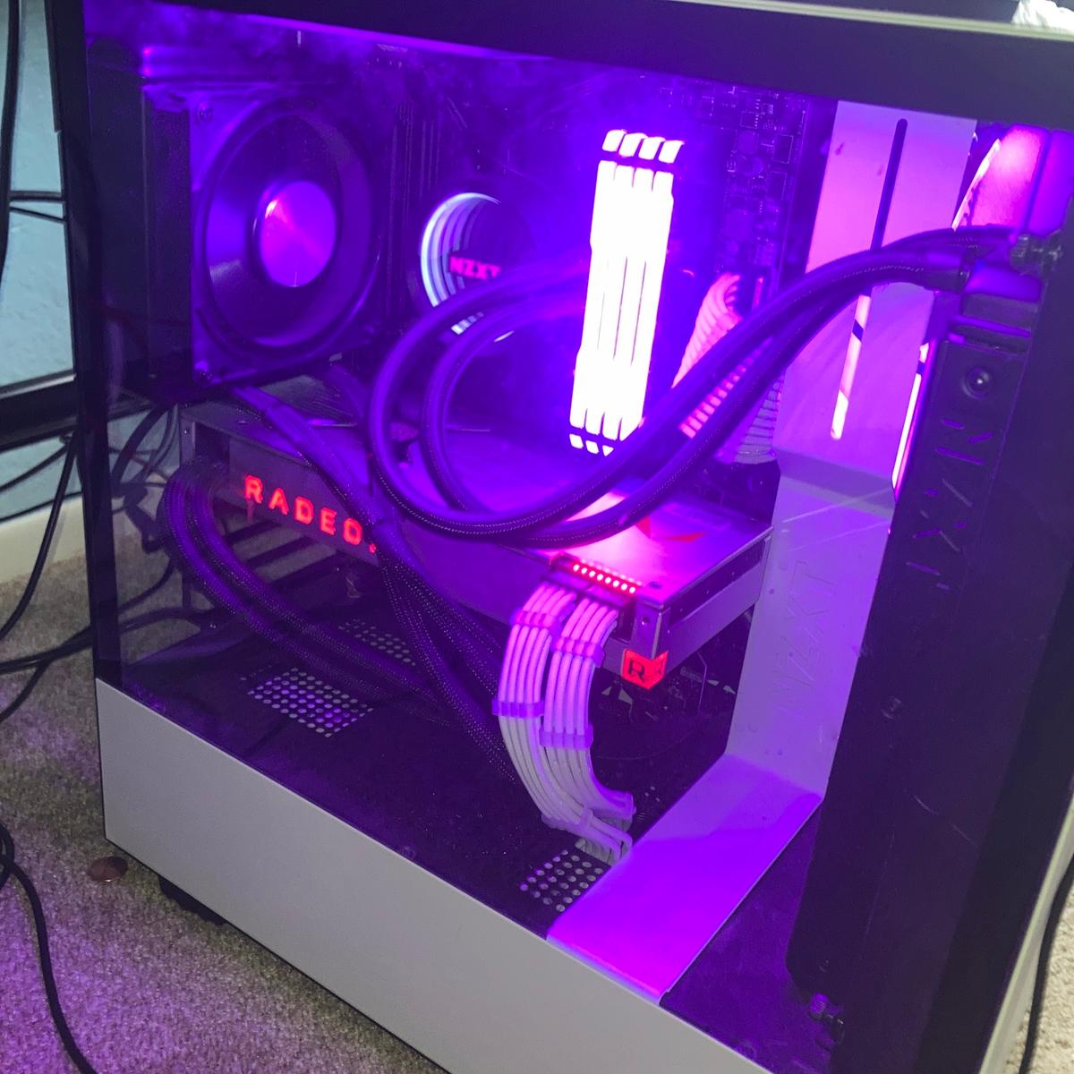 Full build inside white case — Vega 64 LC installed, purple RGB lighting